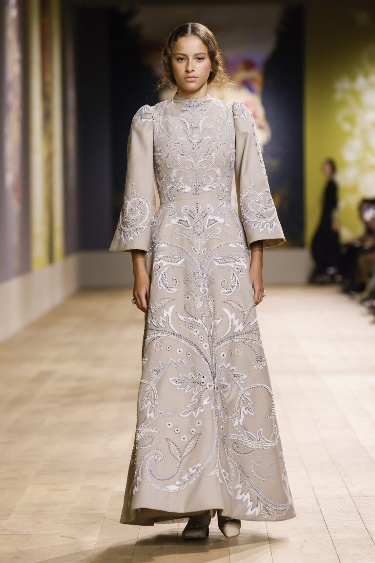 Wool crepe dress enhanced with embroidery scrolls and volutes in cream and gray sky gonse braids and passementerie.