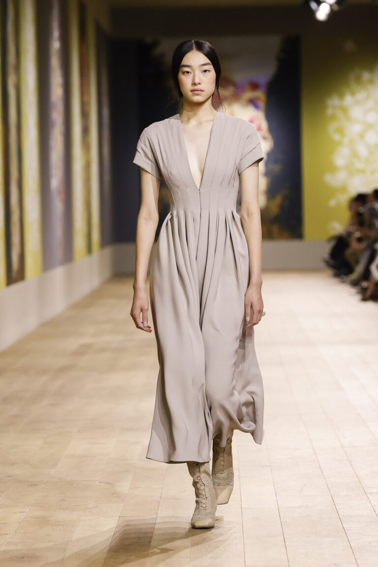 Greige raw silk crepe dress with a row of hollow pleats.
