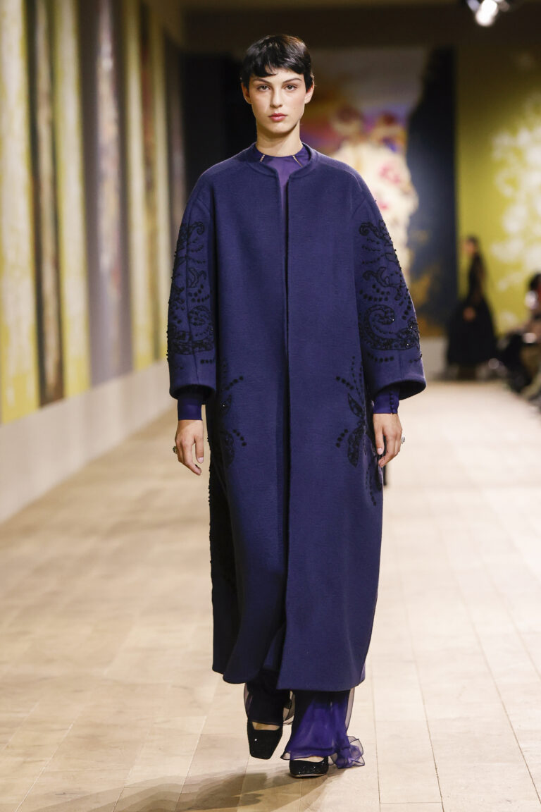 Cashmere coat with giant lampas openwork pattern in block gonse braids enhanced with jet, and navy chiffon dress and entre-deux finishings.
