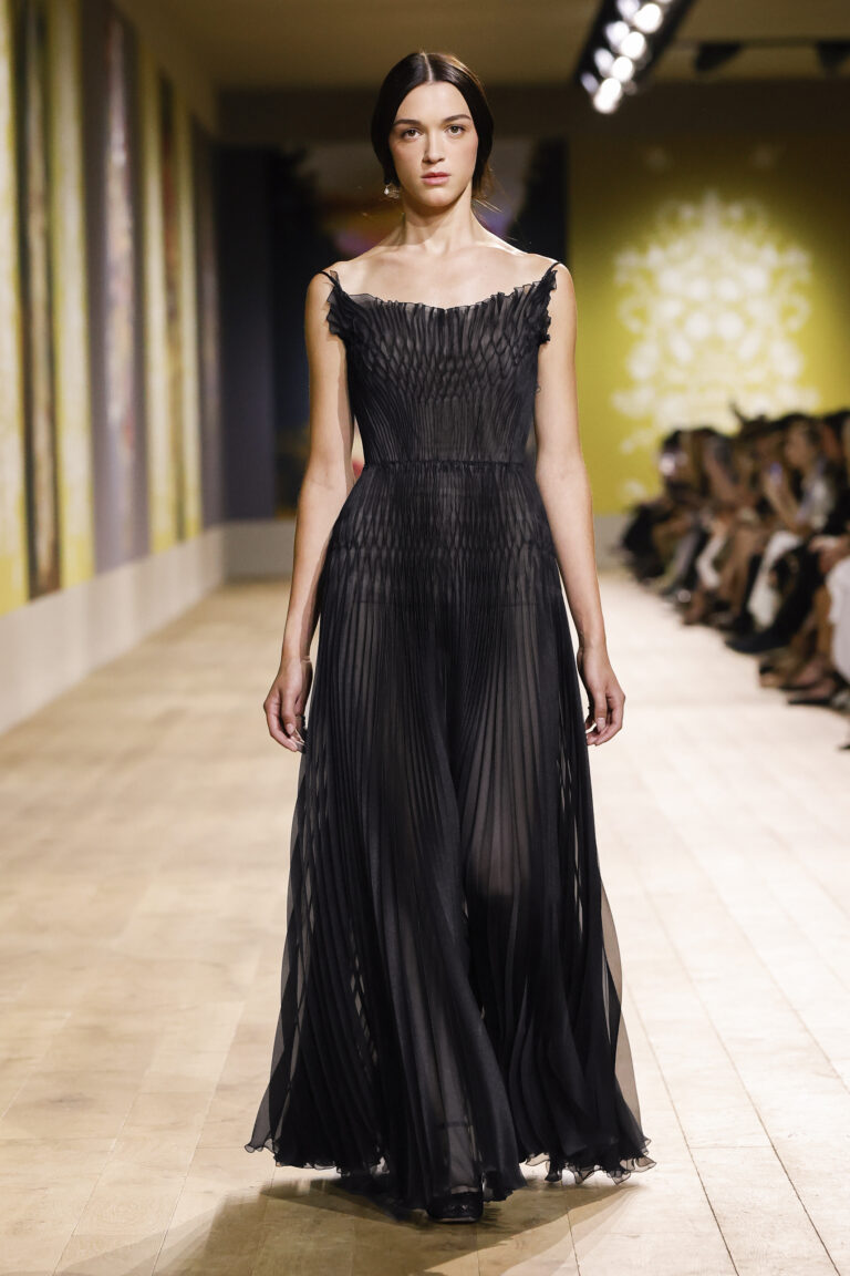 Black silk gauze strapless long dress with bustier and basque enhanced with a microsmock.